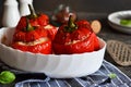Baked stuffed peppers with meat and rice on a concrete background Royalty Free Stock Photo