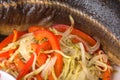 Baked sturgeon with grilled vegetable salad.