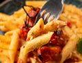 Baked sweet cherry tomatoes and Greek feta cheese fussily pasta. Trendy Vegetarian food