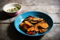 Baked sweet potato chips, homemade, with vegan dip Royalty Free Stock Photo