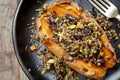 Baked Sweet Potato Stuffed With Wild Rice Seeds and Cranberries