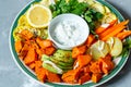 Baked sweet potato, zucchini and carrots Royalty Free Stock Photo