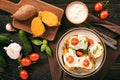 Baked sweet potatoes served with tzatziki dip.