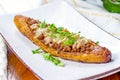 Baked Sweet Ripe Plantain Canoe (Canoas de Platanos Maduros) stuffed with ground meat, cheese and greens