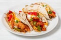 baked tex-mex chicken fajitas on a plate, top view Royalty Free Stock Photo