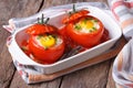 Baked tomatoes stuffed with egg Royalty Free Stock Photo