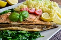 Baked trout fillet with mashed potatoes and steamed spinach Royalty Free Stock Photo