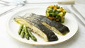 Baked turbot with vegetables. Traditional northern Spanish recipe. Royalty Free Stock Photo