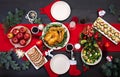 Baked turkey. Christmas dinner. The Christmas table is served with a turkey, decorated with bright tinsel and candles. Fried Royalty Free Stock Photo