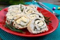 Baked turkey rolls with spinach, mozzarella on plate. Healthy tasty lunch. New Year and Christmas appetizer