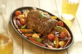 Baked veal with vegetables