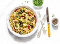 Baked vegetables frittata - delicious appetizer, tapas, snack, breakfast on a light background, top view