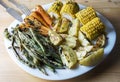 Baked vegetables - green beans, carrots, corn and potatoes Royalty Free Stock Photo