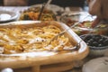 Baked vegetables served in trays, cozy homemade food .