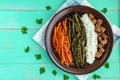 Baked vegetables (asparagus beans and carrot), boiled rice and rye croutons. Royalty Free Stock Photo