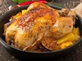 Baked whole chicken with potatoes