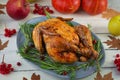 Baked whole chicken or turkey. Roasted homemade chicken with herbs. Thanksgiving day decoration Royalty Free Stock Photo