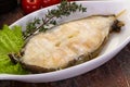 Baked wolffish steak