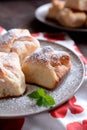 Baked yeast dumpling with curd filling