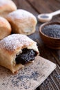 Baked yeast dumpling with poppy seed filling