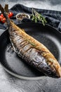 Baked Yellowtail, Japanese amberjack in a pan. Gray background. Top view