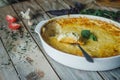 Baked zucchini and cheese soufle with garlic and herbs Royalty Free Stock Photo