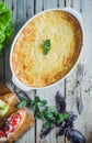 Baked zucchini and cheese soufle with italian bruschetta and herbs Royalty Free Stock Photo