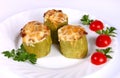 Baked zucchini filled with vegetables