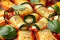 Baked zucchini rolls with ricotta, pecorino cheese in marinara sauce. Healthy food Royalty Free Stock Photo