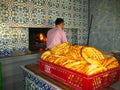 Baker bakes traditional flatbread, Turkey