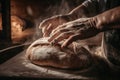 A baker baking traditional, healthy bread in a large oven. Healthy real bread produced using the traditional method.