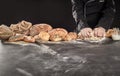 Baker or chef kneading dough for bread