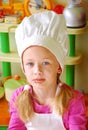 Baker child with cake flour in face