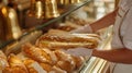a baker handing baked baguette crafted with care, encased in a golden and glass packaging, within the cozy ambiance of a