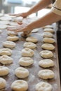 Baker hands at bakery house dough preparation and kneading wooden table with flour bread white knife cutting dough Royalty Free Stock Photo