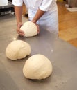 Baker hands and doughs on the counter