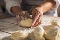 Baker hands preparing bread loaves kneading dough Royalty Free Stock Photo