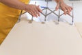 Baker hands using dough slicers for cutting equal portions of dough Royalty Free Stock Photo