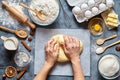 Baker knead dough bread, pizza or pie recipe ingridients with hands, food flat lay