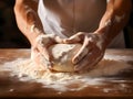 A baker kneading bread dough - Food design