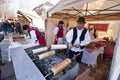 Baker make traditional Hungarian cake at a festival Royalty Free Stock Photo