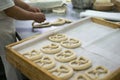 Baker Making Mirrored Pretzel Royalty Free Stock Photo