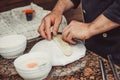 Baker making turkaBaker making turkish pita bread in his bakery. Baking process breish pita bread in his bakery. Baking process br Royalty Free Stock Photo