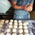 Baker prepares bread rolls Royalty Free Stock Photo