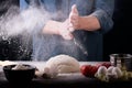 Baker prepares the dough on table Royalty Free Stock Photo