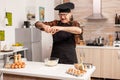 Baker preparing dough