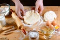 Baker rolling dough with flour bread, pizza or pie recipe ingredients with hands, food on kitchen table background, working with m Royalty Free Stock Photo