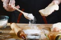 Baker rolling dough with flour bread, pizza or pie recipe ingredients with hands, food on kitchen table background, working with m Royalty Free Stock Photo