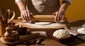 Baker Rolling Dough with Wooden Rolling Pin, Baking Preparation, Kitchen Tools Royalty Free Stock Photo