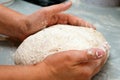 Baker shaping load of bread